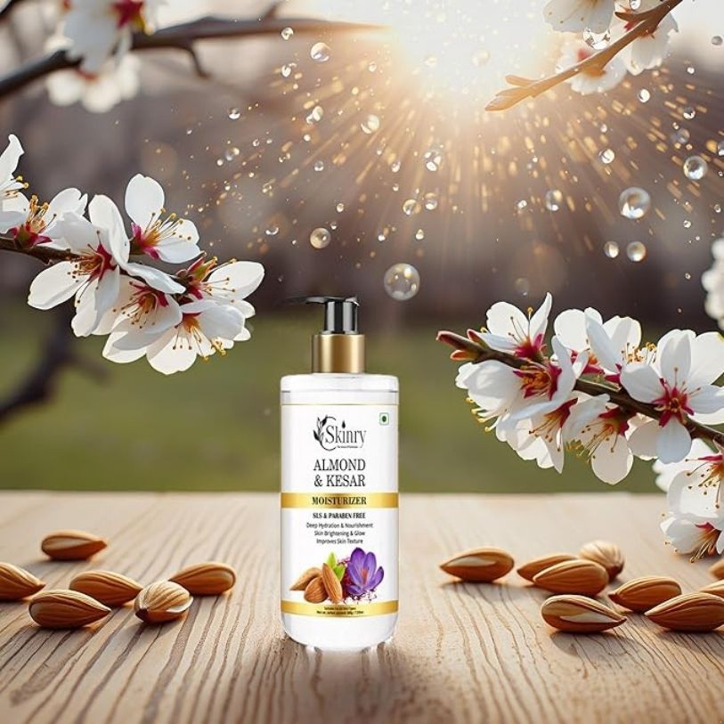 Skinry almond and kesar moisturizer bottle on wooden table with almonds and flowering branches