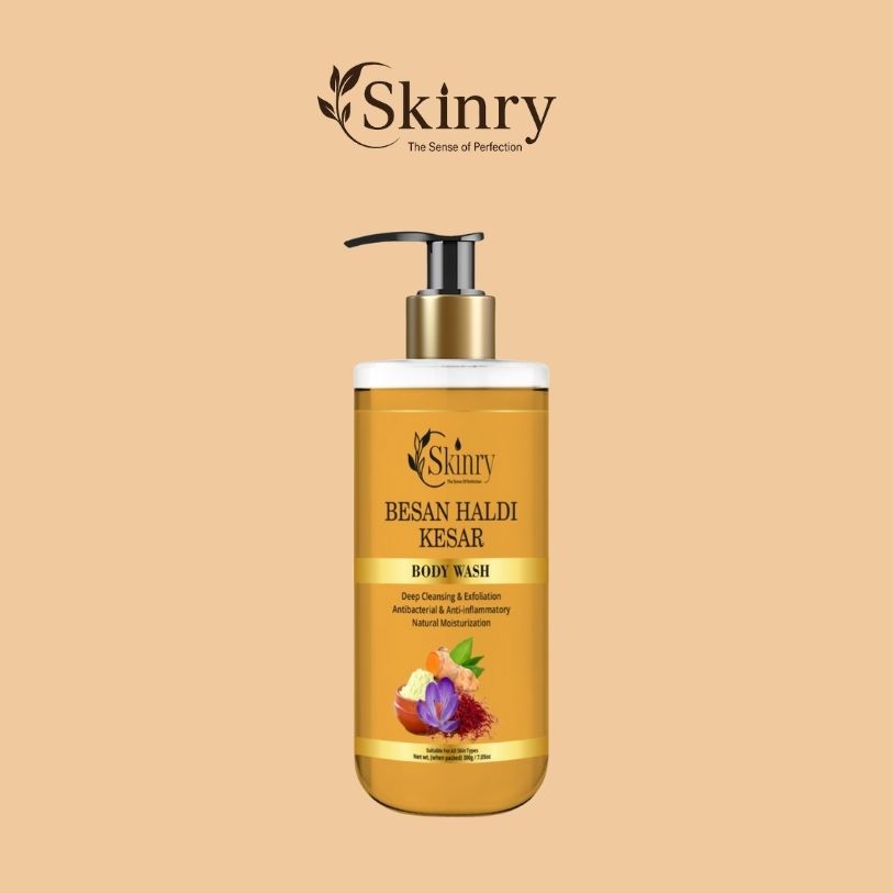 besan haldi kesar body wash nourishing soap bar and boxed packaging styled with flowers and bath accessories
