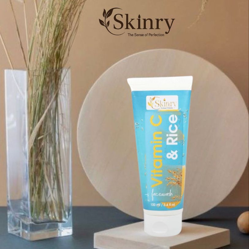 Skinry Vitamin C and Rice face wash tube on display with vase backdrop vitamin c face wash for glowing skin