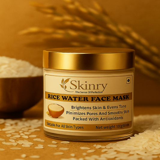 Skinry Rice Water Face Mask jar with golden lid on brown background with rice grains